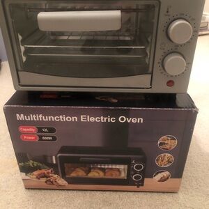 Multifunction Electric Oven - Silver used twice 
Has scratches as shown